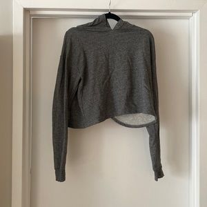 Forever 21 hooded sweatshirt with open back and thumb holes.